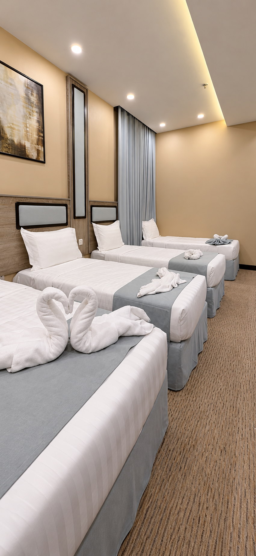 Grand Al Rawda Hotel — Yatak ve oda detayı